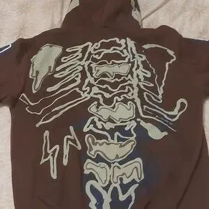 Cactus Jack × Fragment hoodie Buy Cactus Jack by Travis Scott x Fragment Skeleton Graffiti